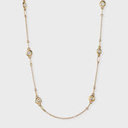 Dazzle with sophistication in our Diamond Station Necklace, a timeless piece that adds elegance to any ensemble.